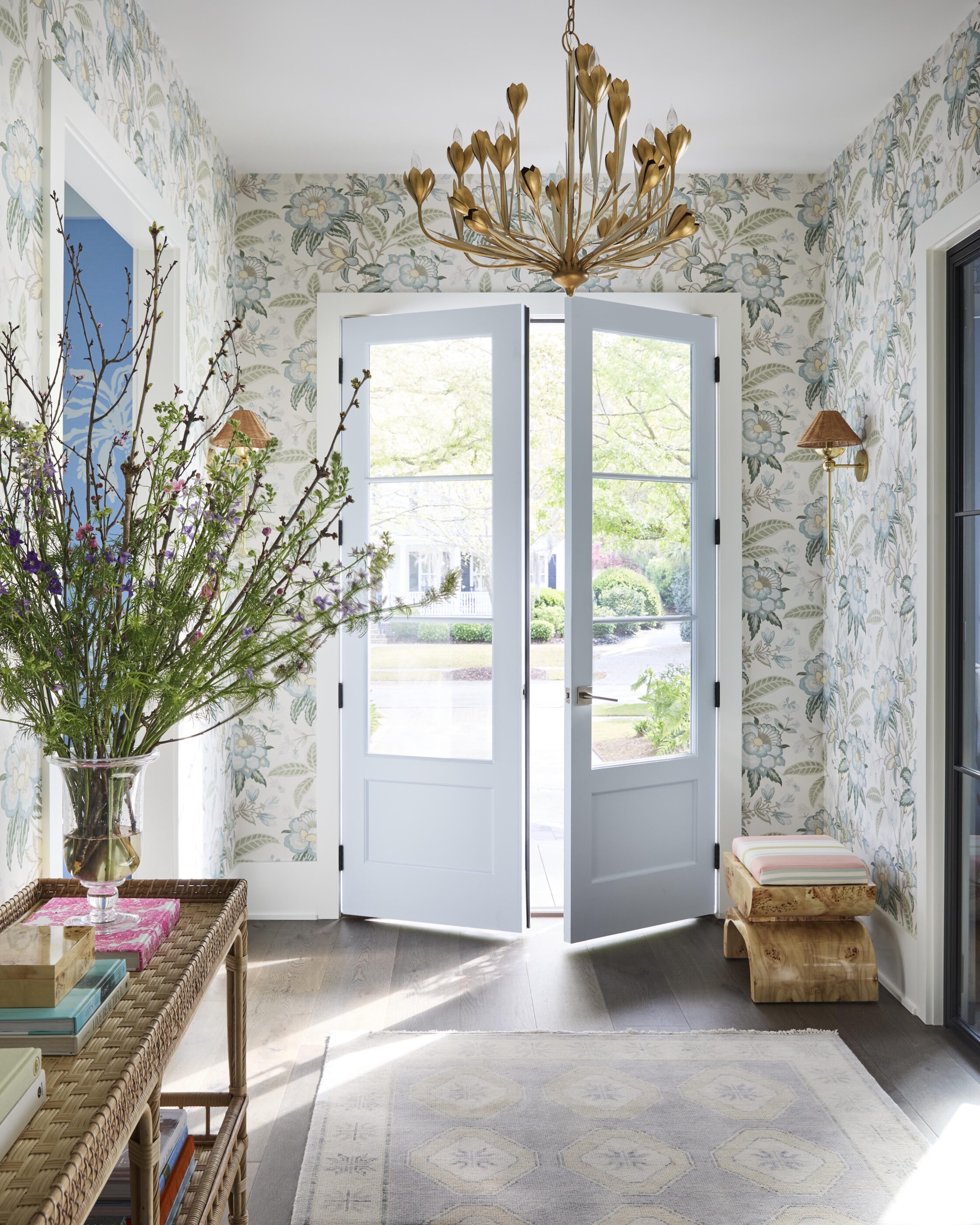 entry doorway icelandic blue cool fresh springtime Interior design by Megan Molten for a coastal, vibrant Mount Pleasant home featuring the Lilly Pulitzer x Lee Jofa collection