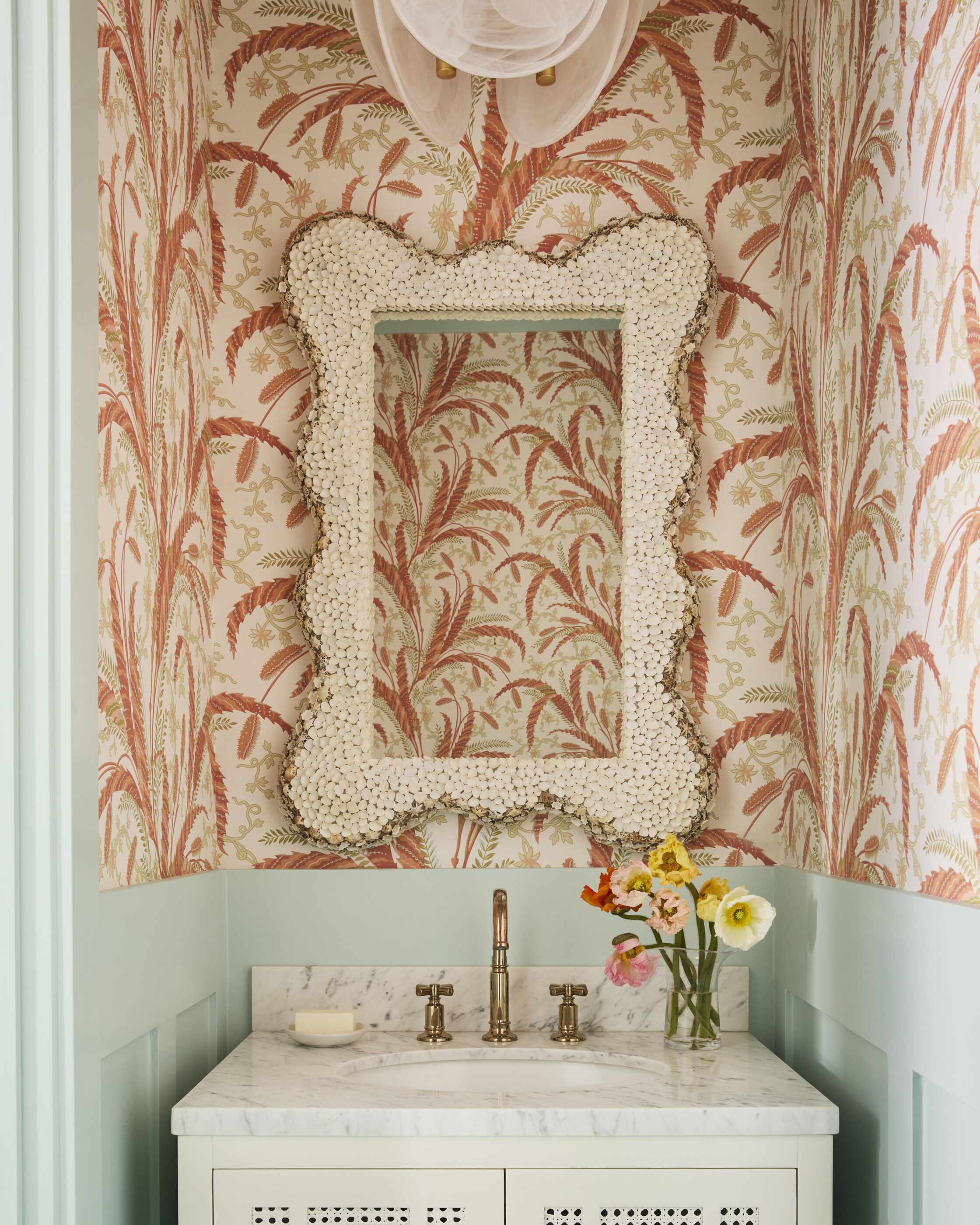 powder bathroom guest bath wallpaper orange and teal blue florals design interior decor Interior design by Megan Molten