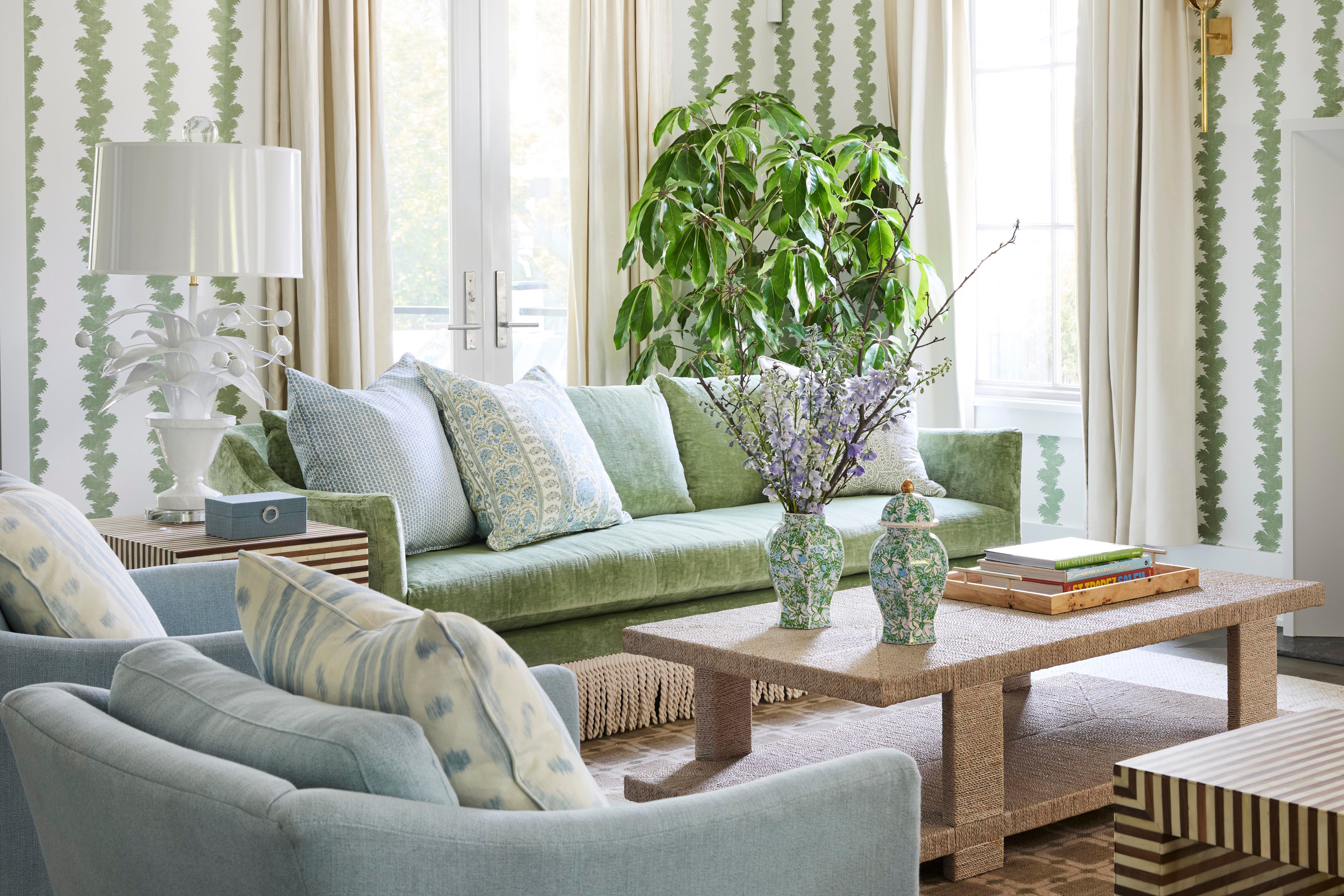 Interior design by Megan Molten for a coastal, vibrant Mount Pleasant home featuring the Lilly Pulitzer x Lee Jofa collection wallpaper green living room