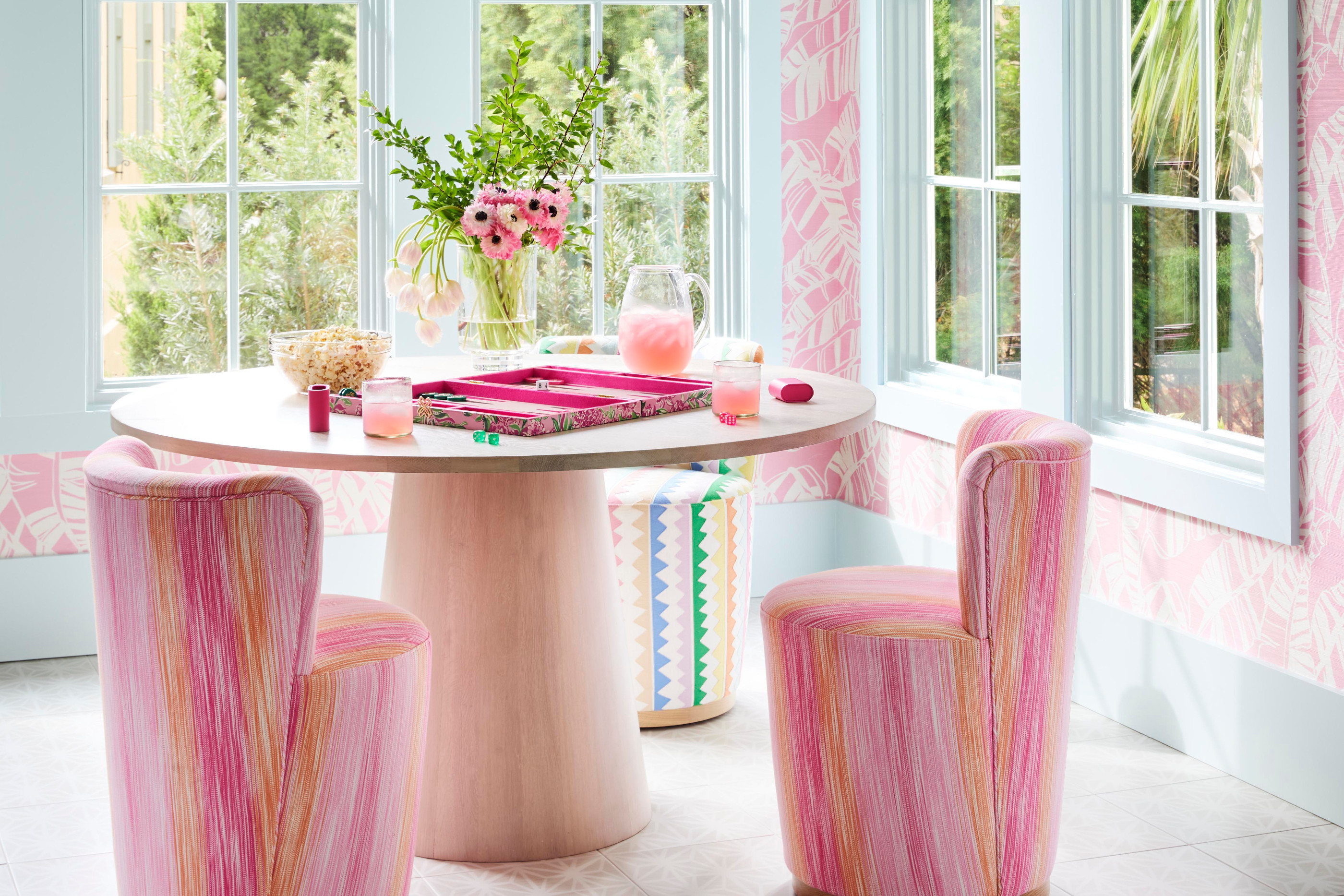 Interior design by Megan Molten for a coastal, vibrant Mount Pleasant home featuring the Lilly Pulitzer x Lee Jofa collection pink game room feminine florals lemonade summer