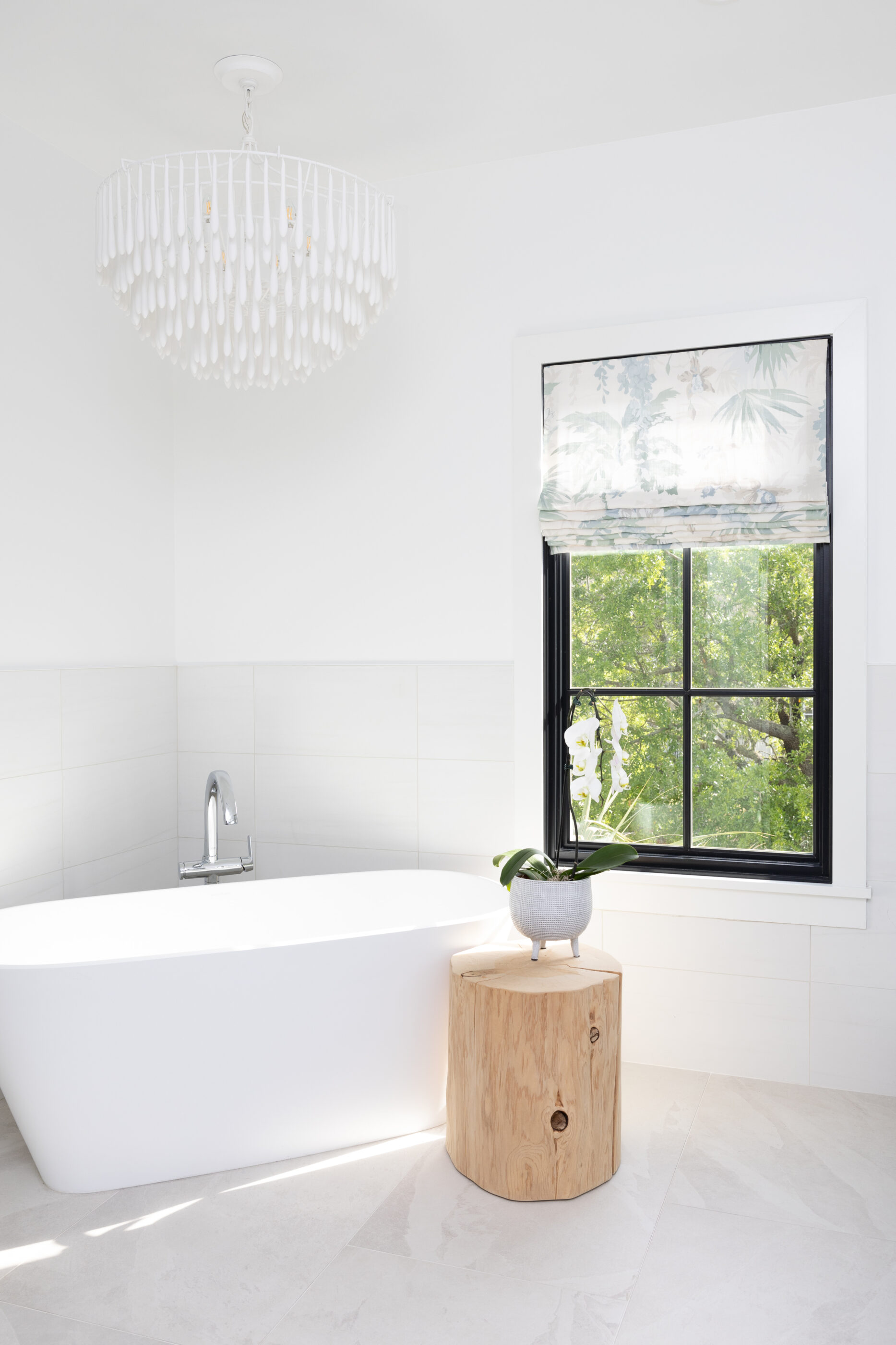 Interior design by Megan Molten for a coastal, vibrant Mount Pleasant home featuring the Lilly Pulitzer x Lee Jofa collection white clean bathtub