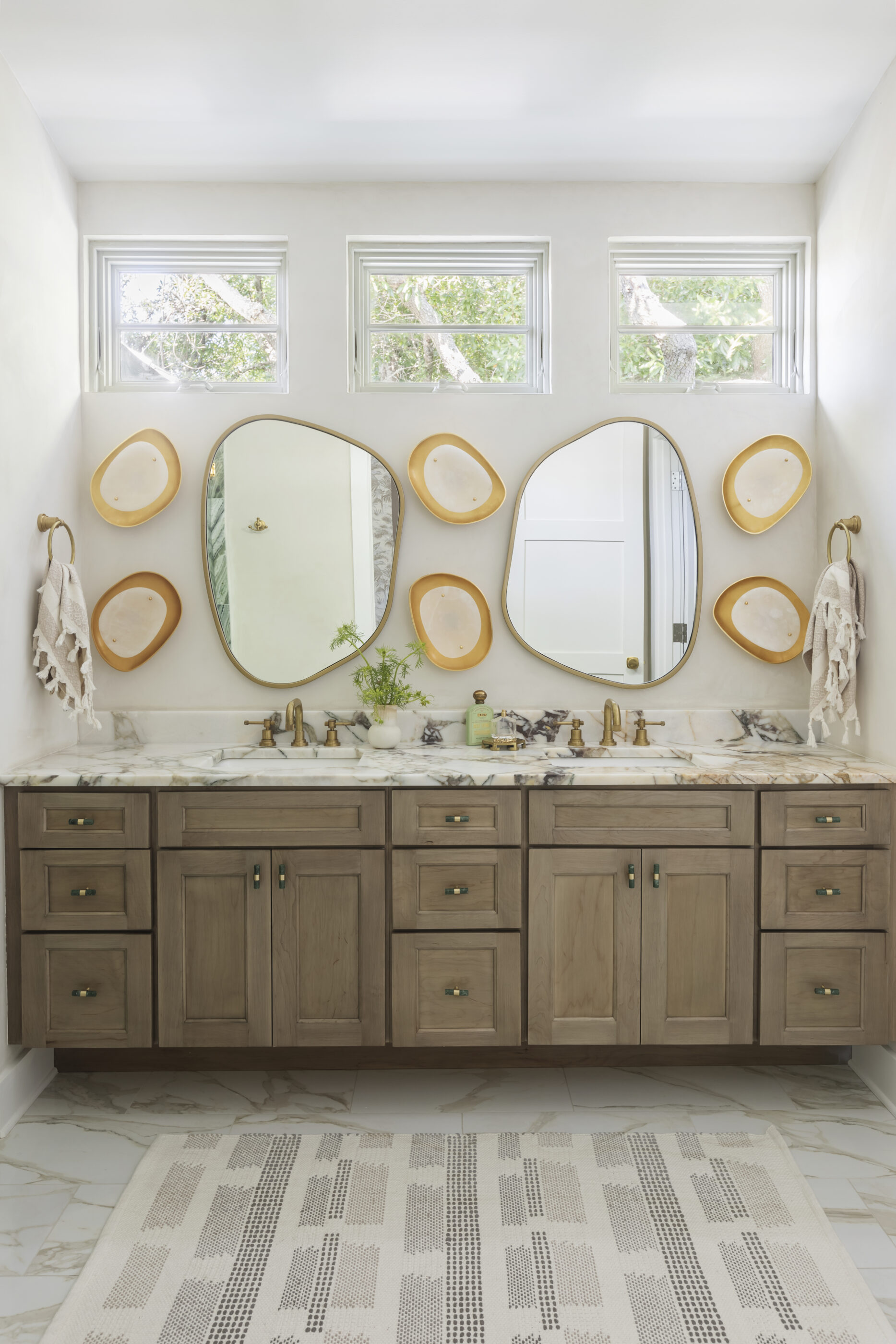 funky folly beach interior design green stone shower bathroom asymmetrical architecture Megan Molten organic shapes mirrors