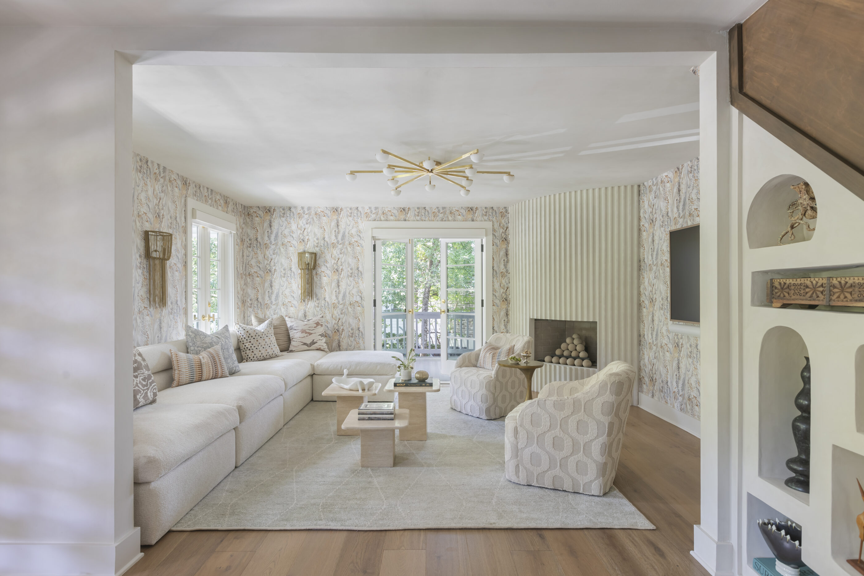 interior design living room entry artwork lowcountry funky folly beach decor upholstery details wallpaper lighting seating entertaining sectional